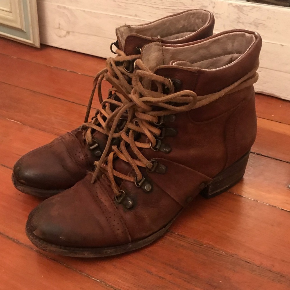 Freebird by Steve Madden lace-up leather boots.